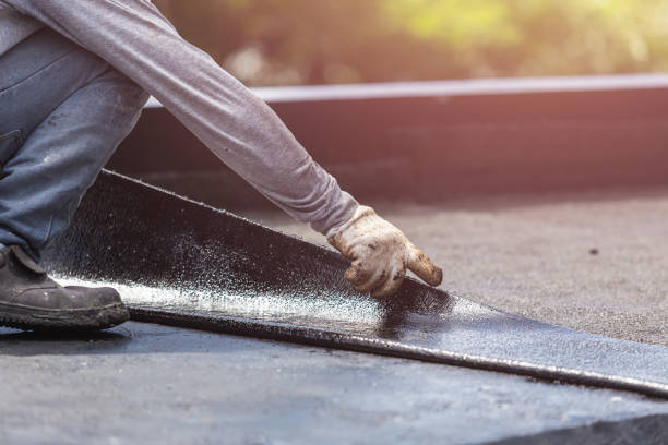 Professional Basement Waterproofing technician working in Columbus, IN